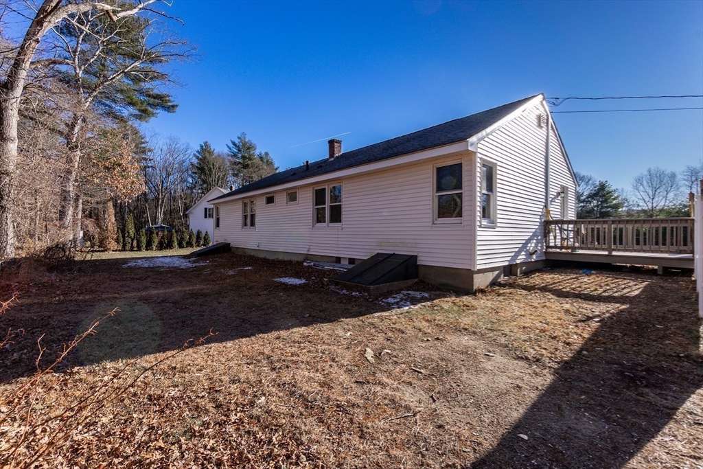 65 Depot Road, Unit A Oxford, MA 01540 - Photo 14 of 17 a view of a house with a yard