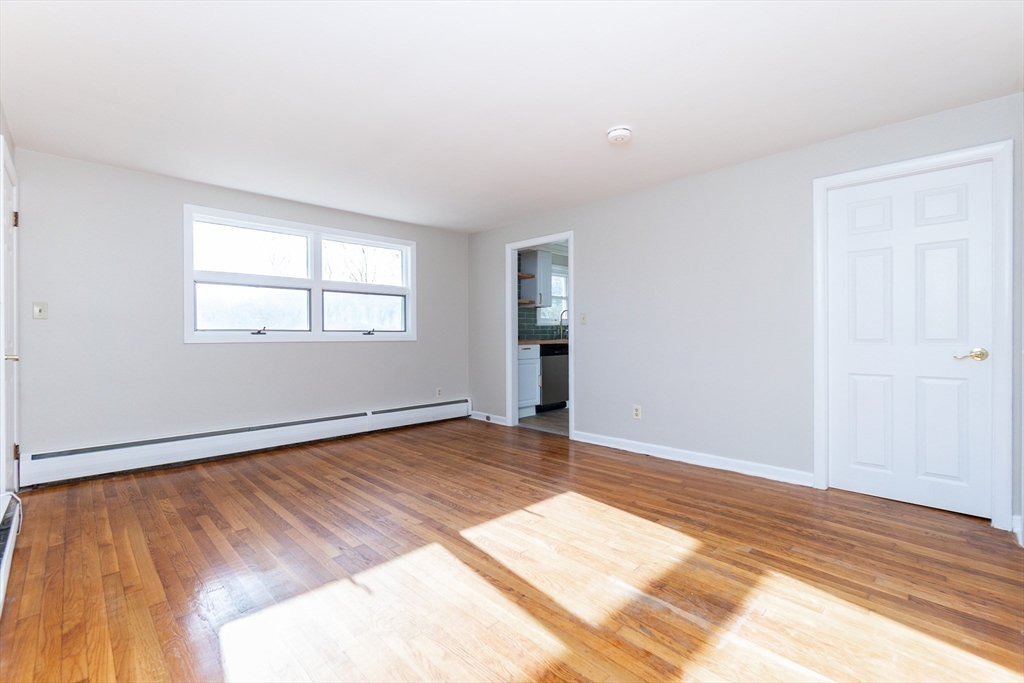65 Depot Road, Unit A Oxford, MA 01540 - Photo 6 of 17 a view of an empty room and window