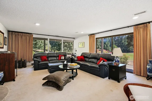 a kitchen with stove top oven and cabinets