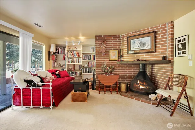 a kitchen with cabinets and stainless steel appliances