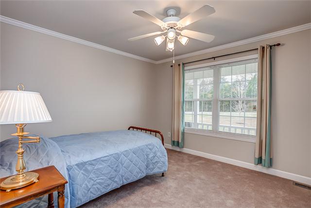 4645 Smiley Road Chapel Hill, TN 37034 - Photo 12 of 20 One of the secondary bedrooms features a large sunlit window and more than ample wall space for a large bed and multiple pieces of furniture.