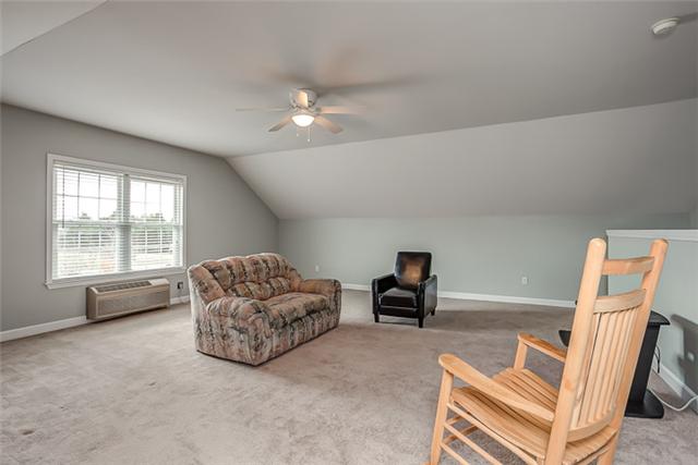 4645 Smiley Road Chapel Hill, TN 37034 - Photo 15 of 20 Just above the garage, and accessible to the living area through a back staircase, this 25x21 bonus room is just the ticket for that man cave, media room, or a pool/Ping-Pong space.