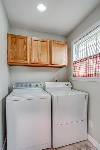 4645 Smiley Road Chapel Hill, TN 37034 - Photo 17 of 20 Adjacent to the kitchen, this oversized utility room houses a full-size washer and dryer, brooms and mops, and other necessities.