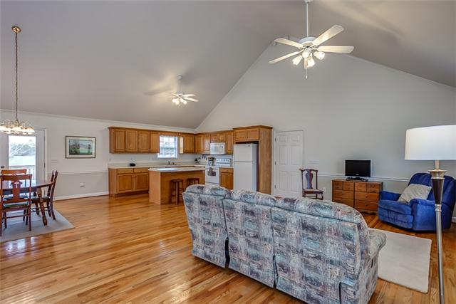 Every square inch of flooring in this living area is composed of sand-to-finish hardwood solid oak flooring.  Enjoyable and easy to clean, these floors are higher quality than what other homes feature.