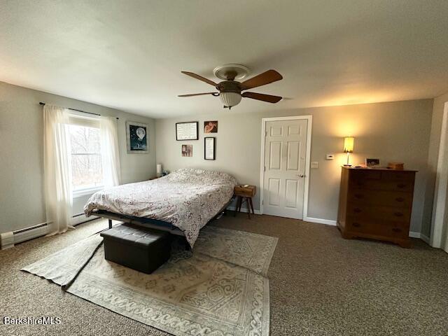 279 Goss Hill Road Chester, MA 01050 - Photo 15 of 24 a bedroom with a bed and a ceiling fan