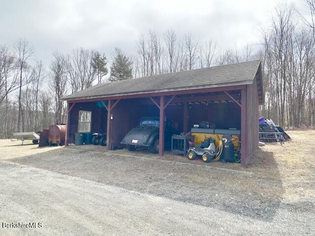 279 Goss Hill Road Chester, MA 01050 - Photo 21 of 24 a view of a house with a yard and garage
