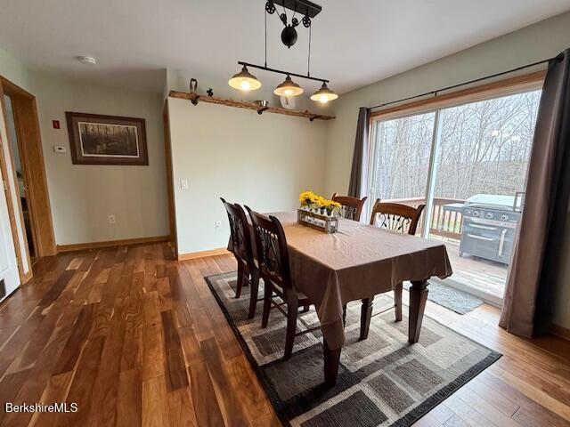 279 Goss Hill Road Chester, MA 01050 - Photo 8 of 24 a view of a dining room with furniture window and wooden floor