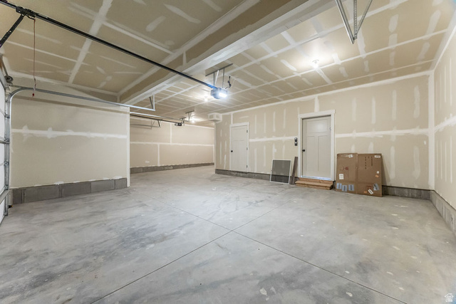 3308 South 1000 West Logan, UT 84321 - Photo 27 of 30 Concrete flooring with exposed drywall and flush-mounted ceiling lighting