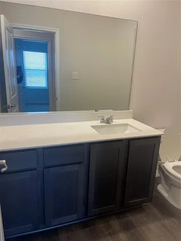 a bathroom with a toilet and a bathtub