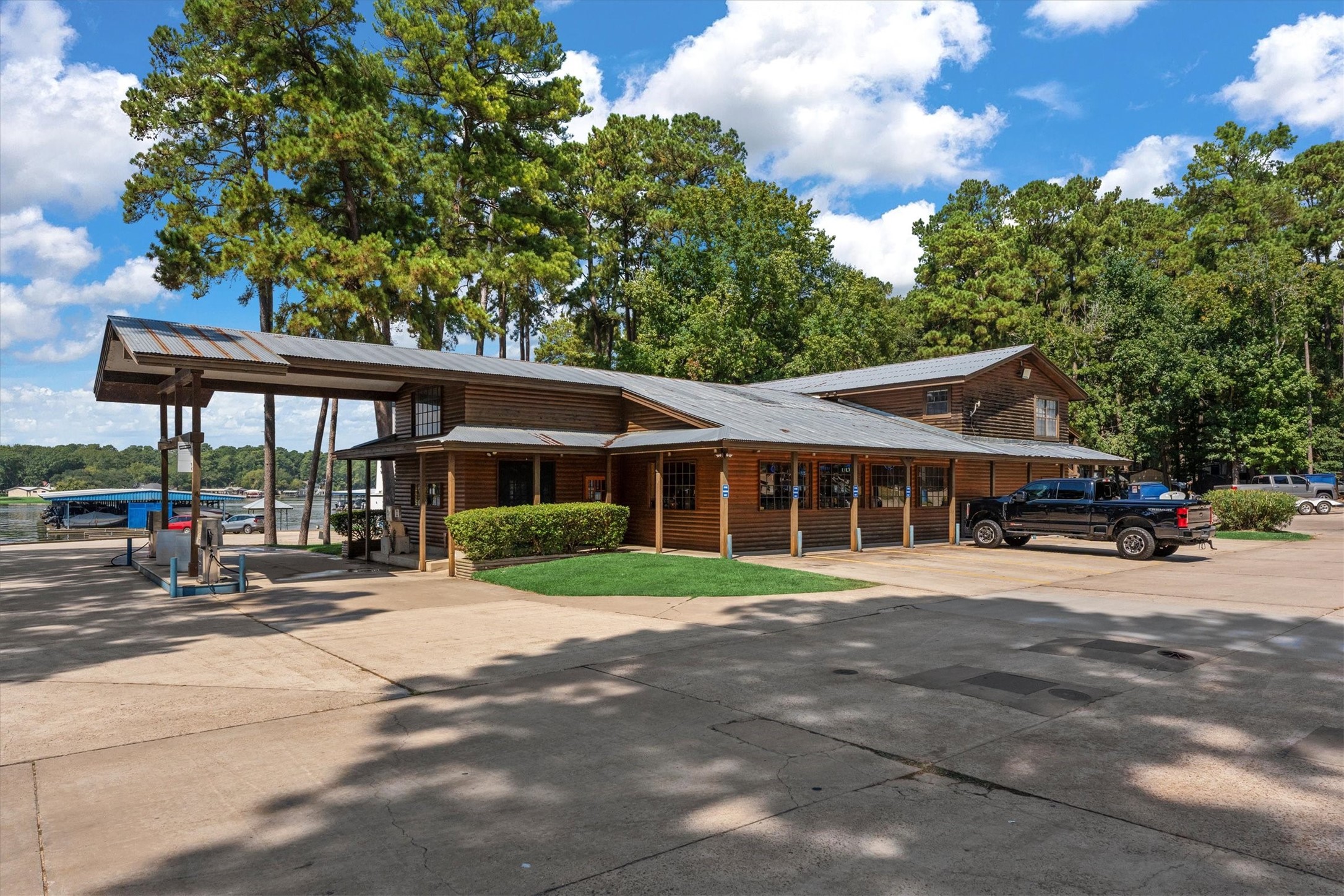 12912 Lake Conroe Bay Road Willis, TX 77318 - Photo 27 of 33 a front view of a house with a yard