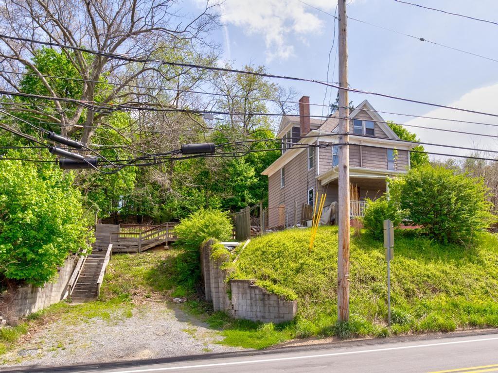 645 Virginia Avenue Rochester, PA 15074 - Photo 2 of 14 a view of a yard in front of house