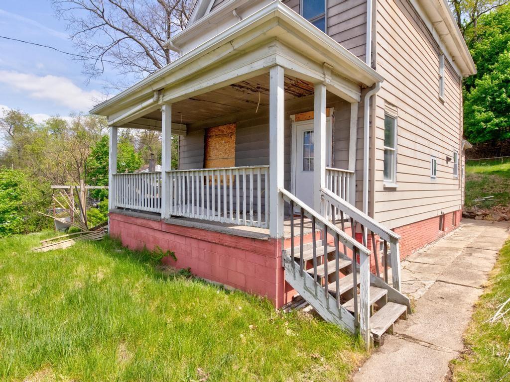 645 Virginia Avenue Rochester, PA 15074 - Photo 4 of 14 front view of a house with a yard