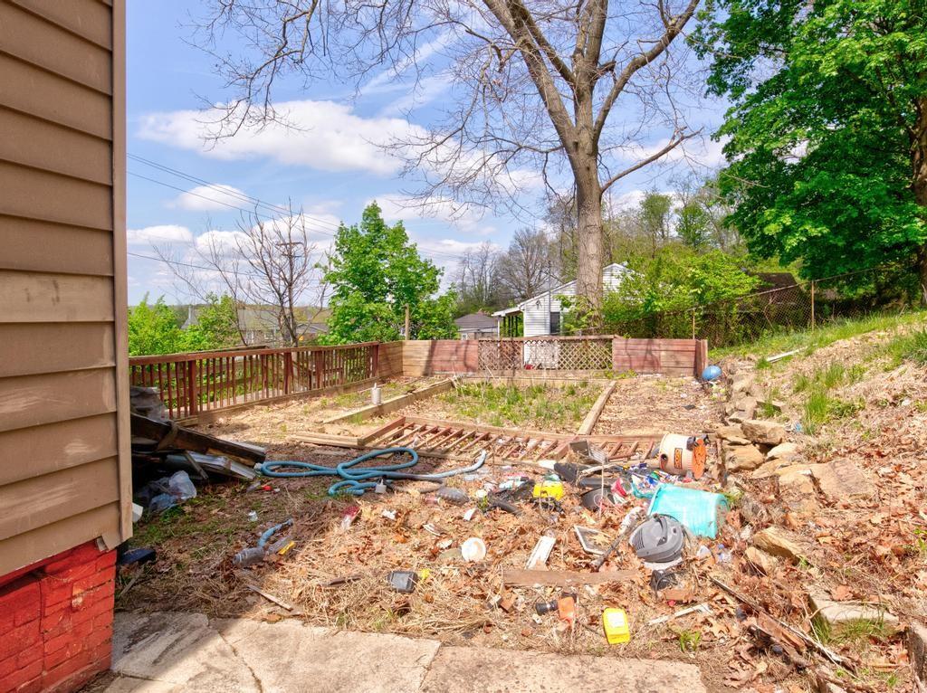 645 Virginia Avenue Rochester, PA 15074 - Photo 5 of 14 a view of yard with wooden fence