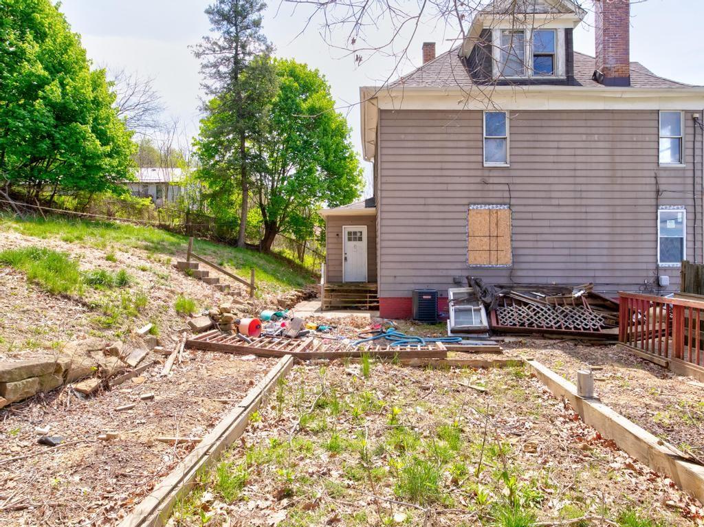 645 Virginia Avenue Rochester, PA 15074 - Photo 8 of 14 a view of a house with yard and sitting area