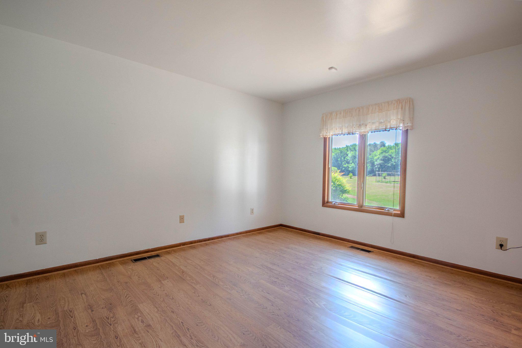 31749 Morris Leonard Road Parsonsburg, MD 21849 - Photo 12 of 40 Bright and airy room with scenic views.