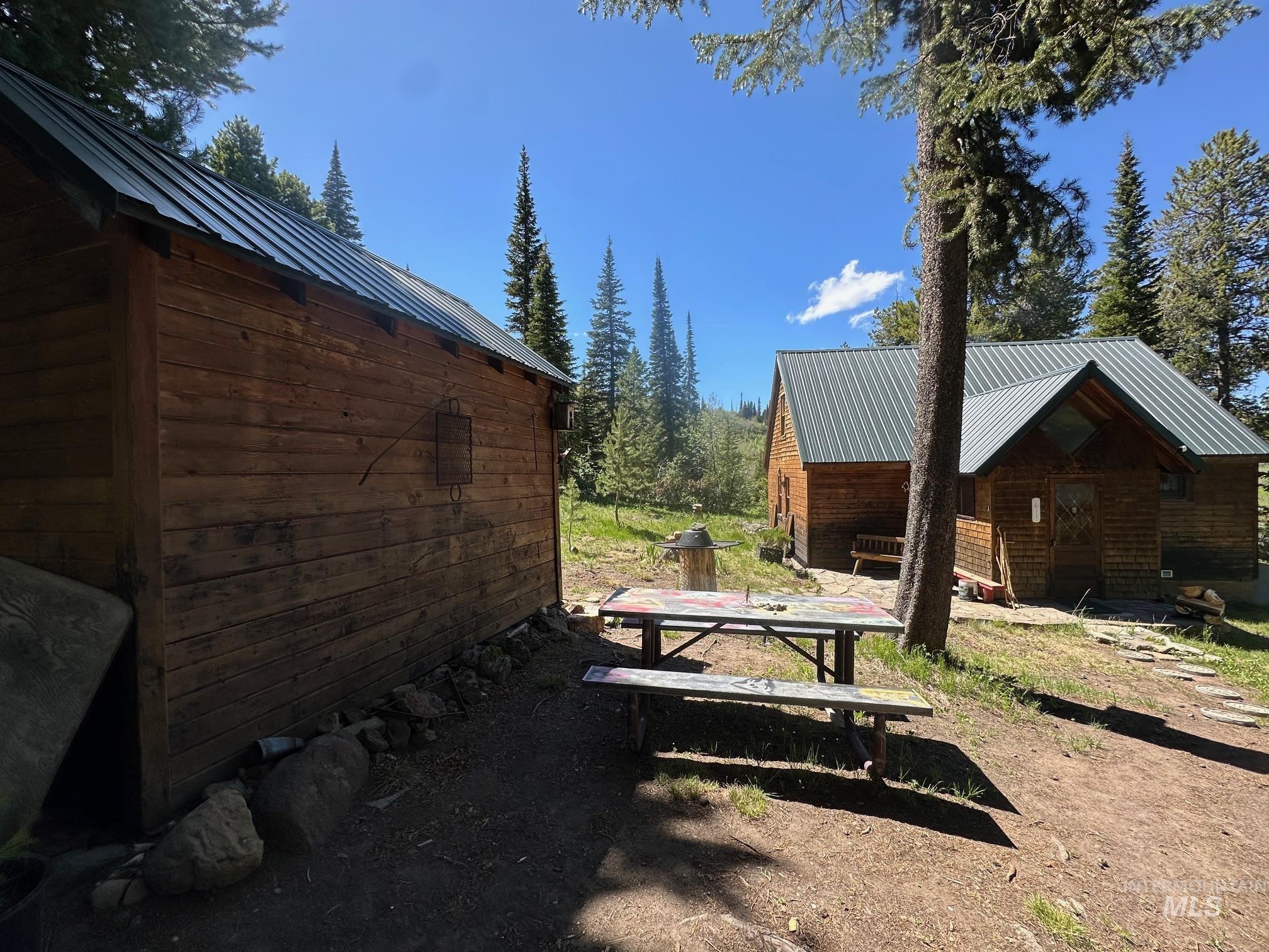 509 Deadline Road, Unit 2 Twin Falls, ID 83301 - Photo 6 of 28 Two wood-sided structures with metal roofs