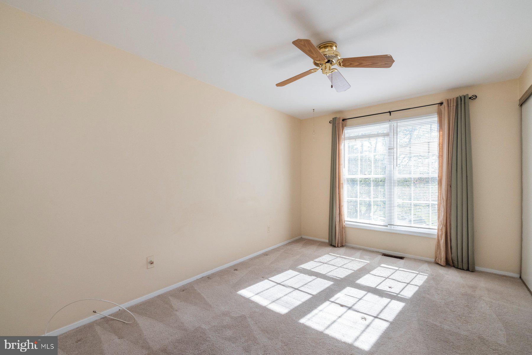 39 Triple Crown Court Gaithersburg, MD 20878 - Photo 14 of 26 a view of an empty room with a window