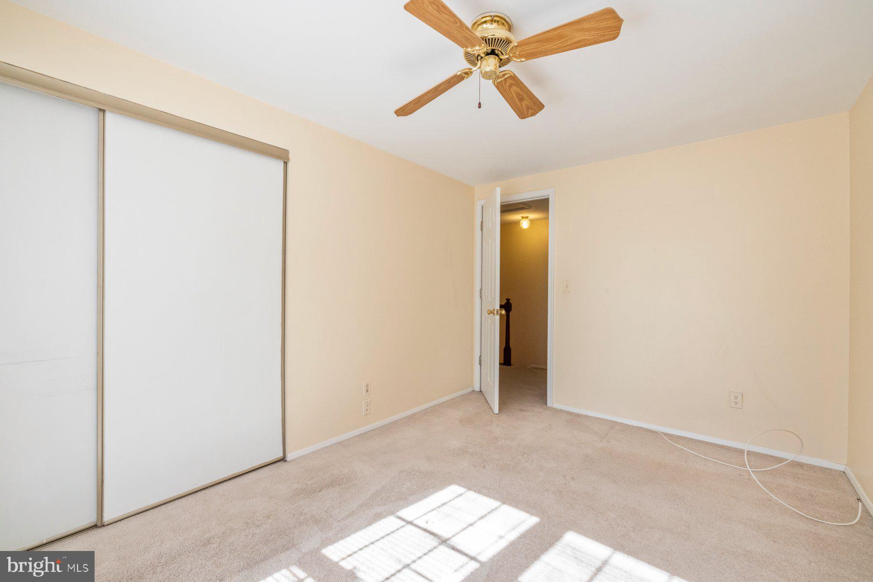 39 Triple Crown Court Gaithersburg, MD 20878 - Photo 15 of 26 a view of a room with a ceiling fan