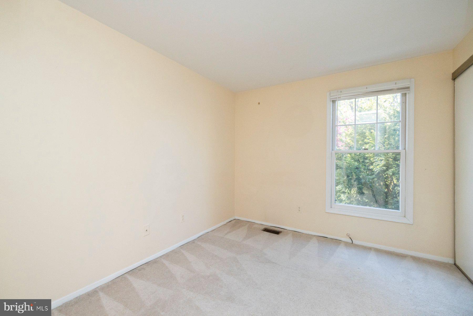 39 Triple Crown Court Gaithersburg, MD 20878 - Photo 18 of 26 an empty room with a window