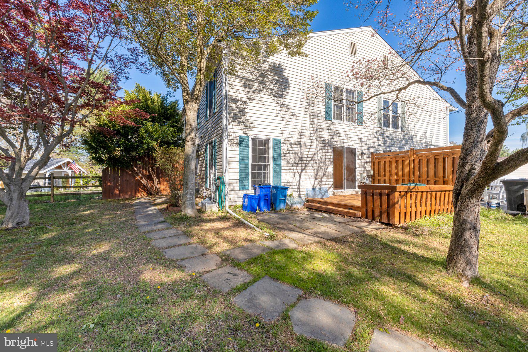 39 Triple Crown Court Gaithersburg, MD 20878 - Photo 25 of 26 a view of a house with a yard and tree s