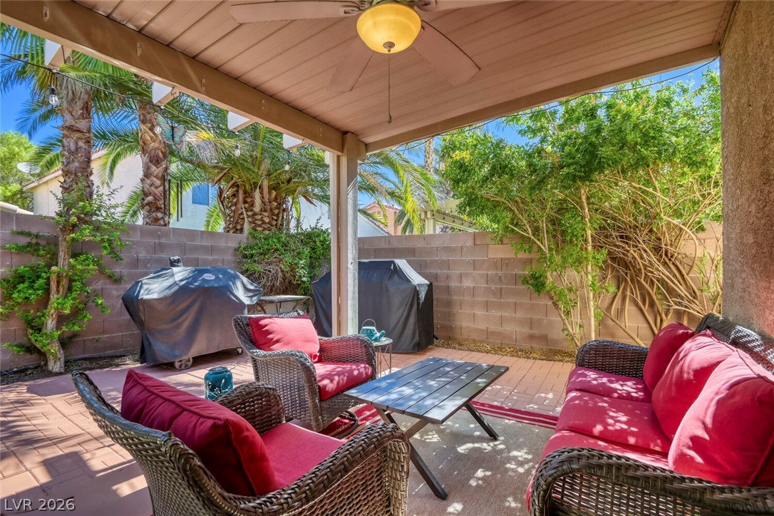 2356 Tilden Way Henderson, NV 89074 - Photo 24 of 30 A private backyard oasis with a covered patio, perfect for relaxing or entertaining.