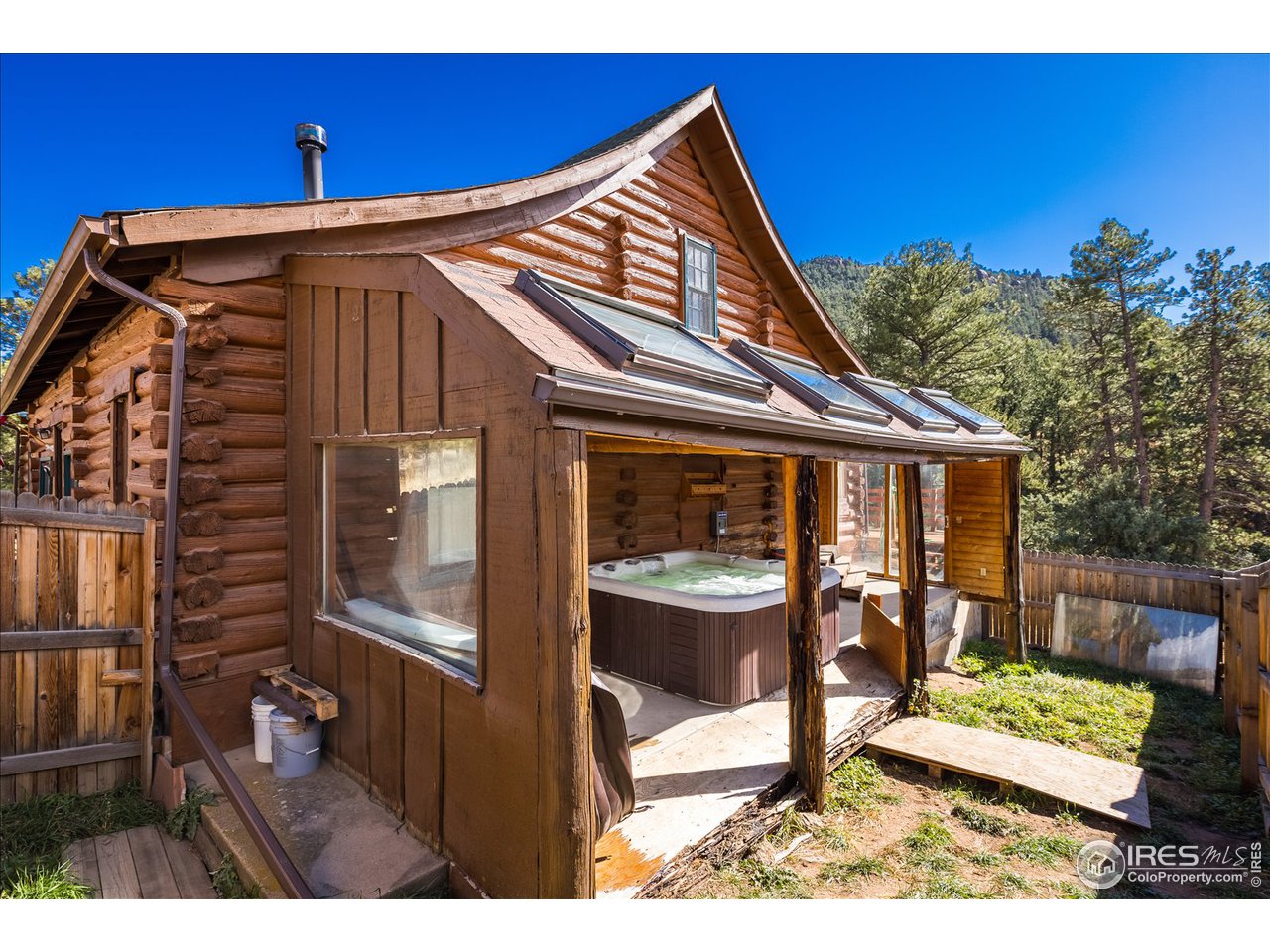 234 Kiowa Road Lyons, CO 80540 - Photo 26 of 39 Side porch, hot tub area
