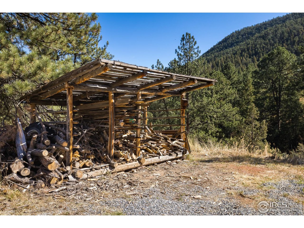 234 Kiowa Road Lyons, CO 80540 - Photo 34 of 39 Firewood storage