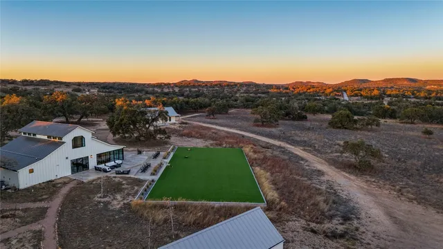 a view of a street with a yard