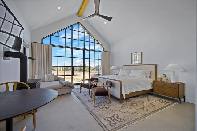 a bedroom with furniture or couch and a window