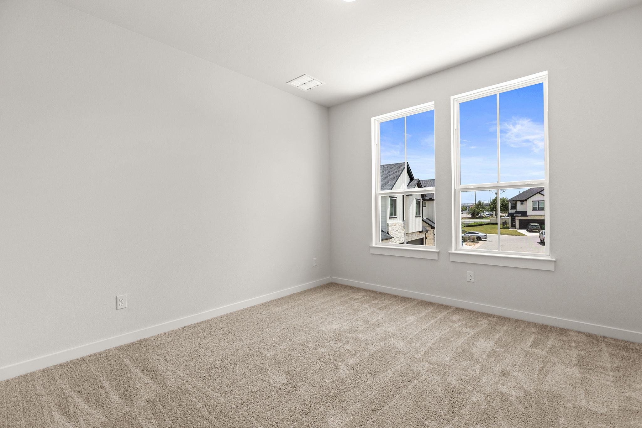 2600 Gattis School Road, Unit 1002 Round Rock, TX 78664 - Photo 27 of 40 Sun-filled room boasts plush carpeting and naturally illuminated walls.