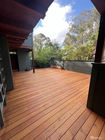 a view of swimming pool with seating space