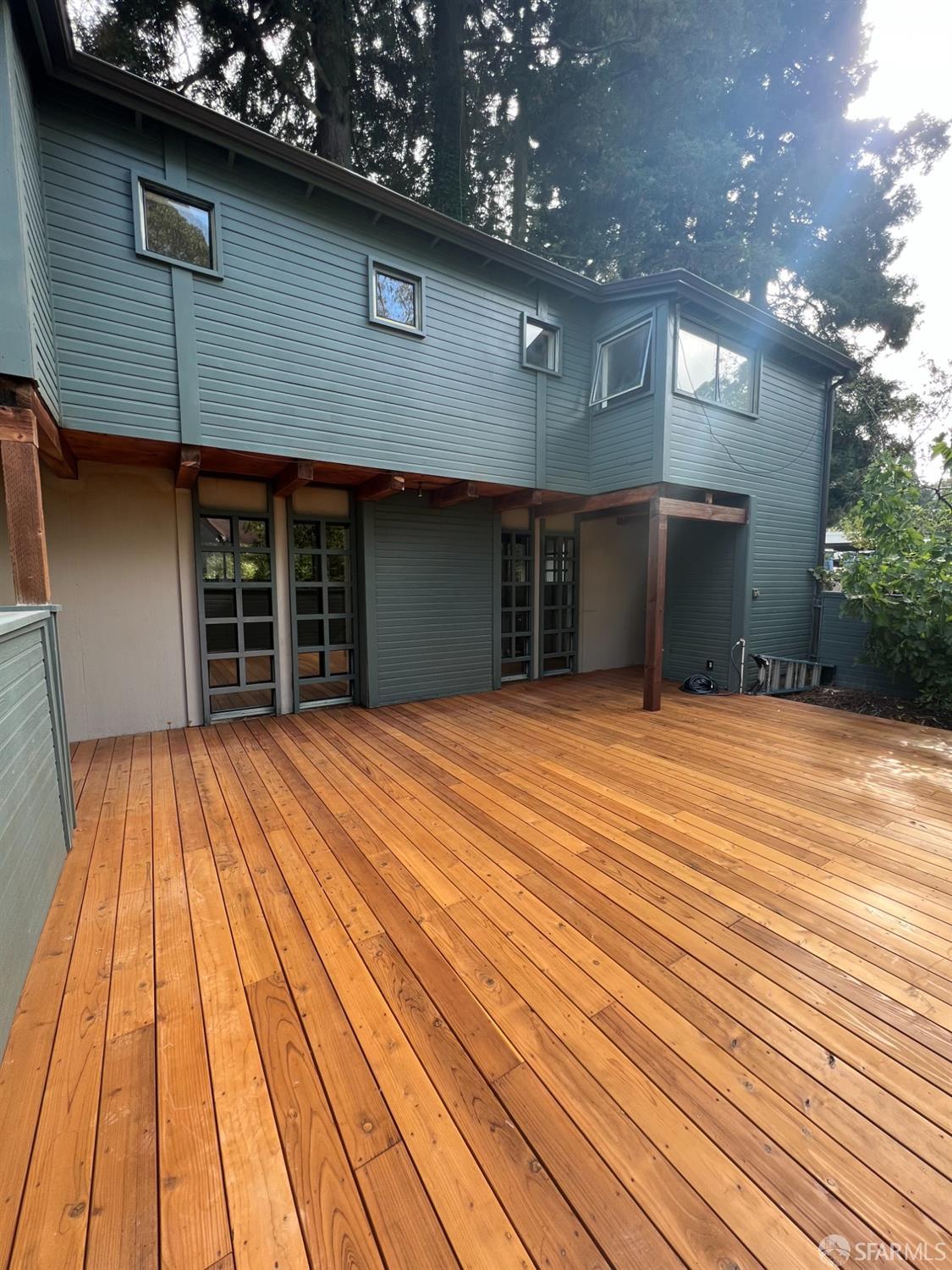 22 Columbia Circle Berkeley, CA 94708 - Photo 17 of 19 a view of a backyard of a house with a wooden deck