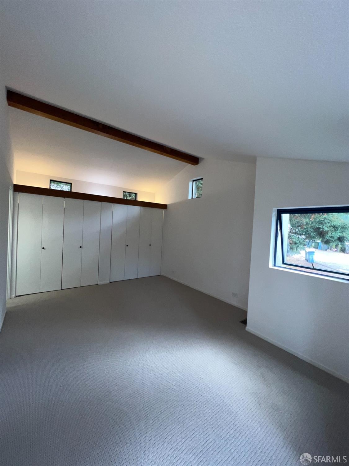 22 Columbia Circle Berkeley, CA 94708 - Photo 9 of 19 an empty room with a empty space and windows