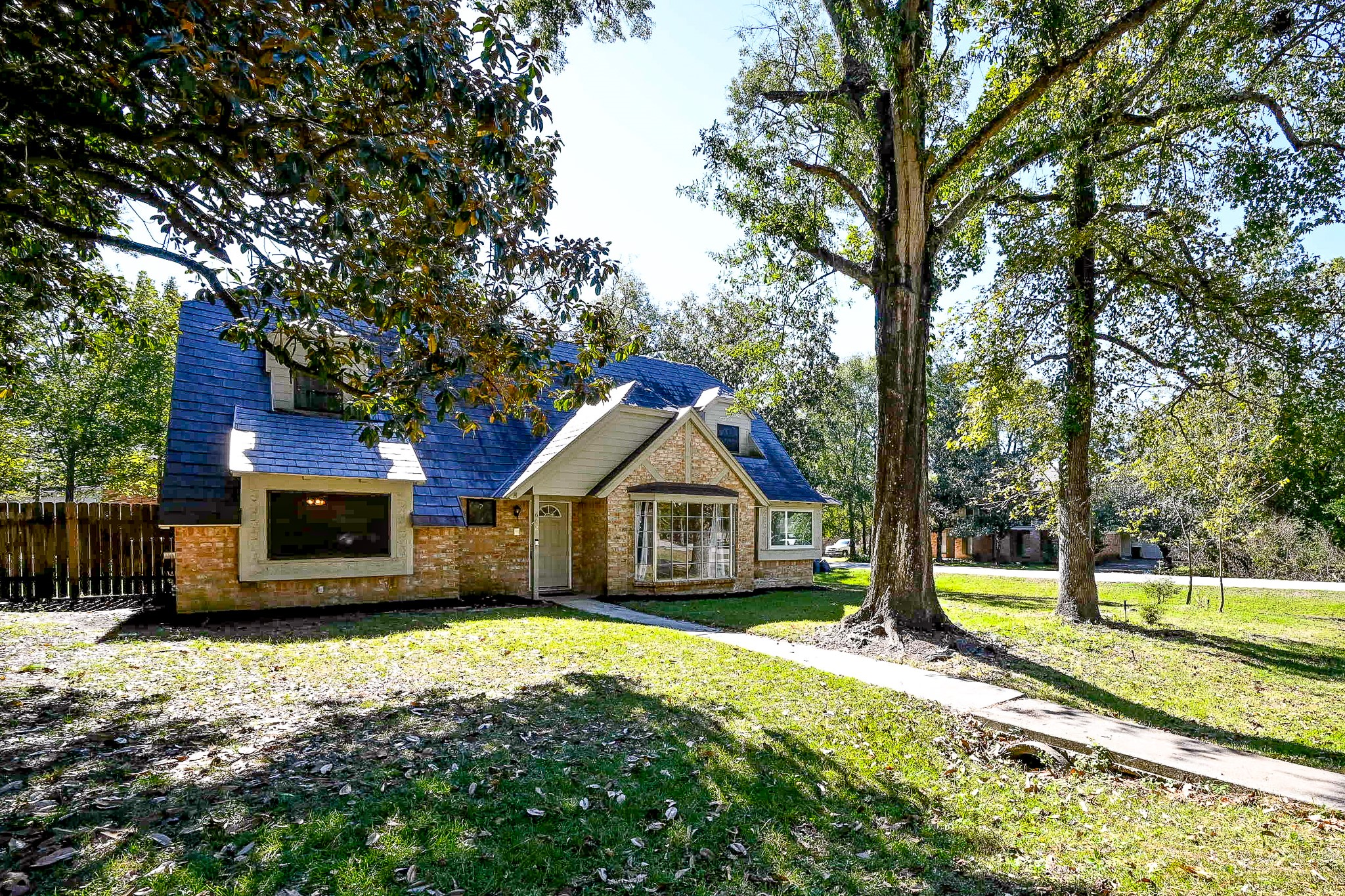 602 Mobile Court Conroe, TX 77302 - Photo 3 of 30 a front view of a house with a yard