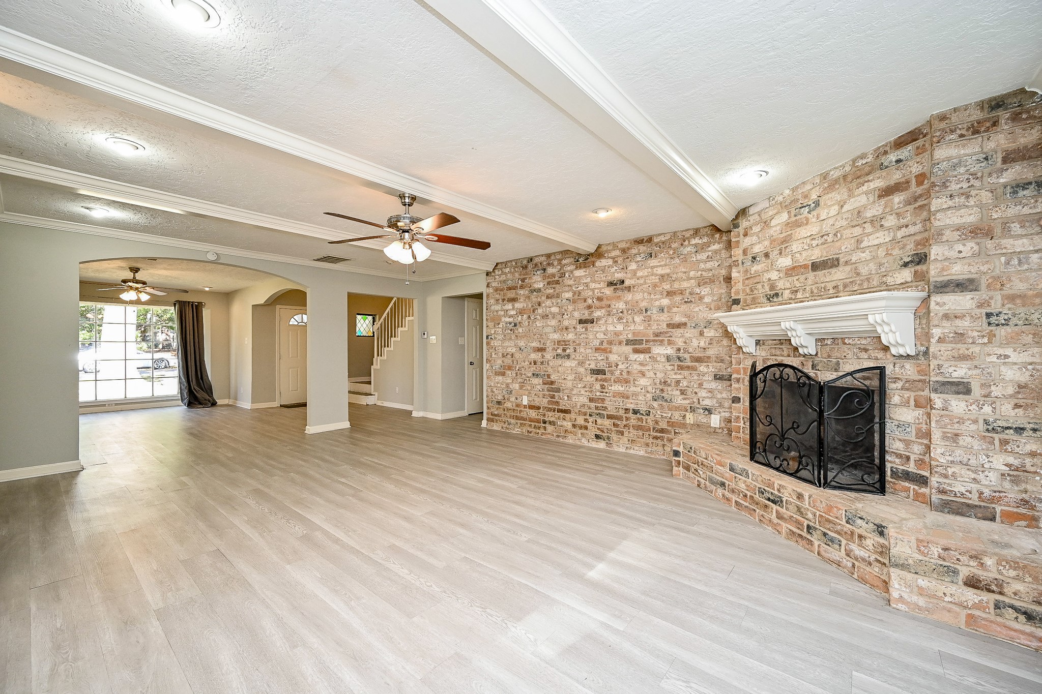 602 Mobile Court Conroe, TX 77302 - Photo 7 of 30 a view of a livingroom with an empty space and a fireplace