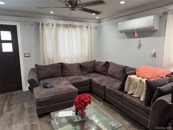 a living room with furniture and a couch
