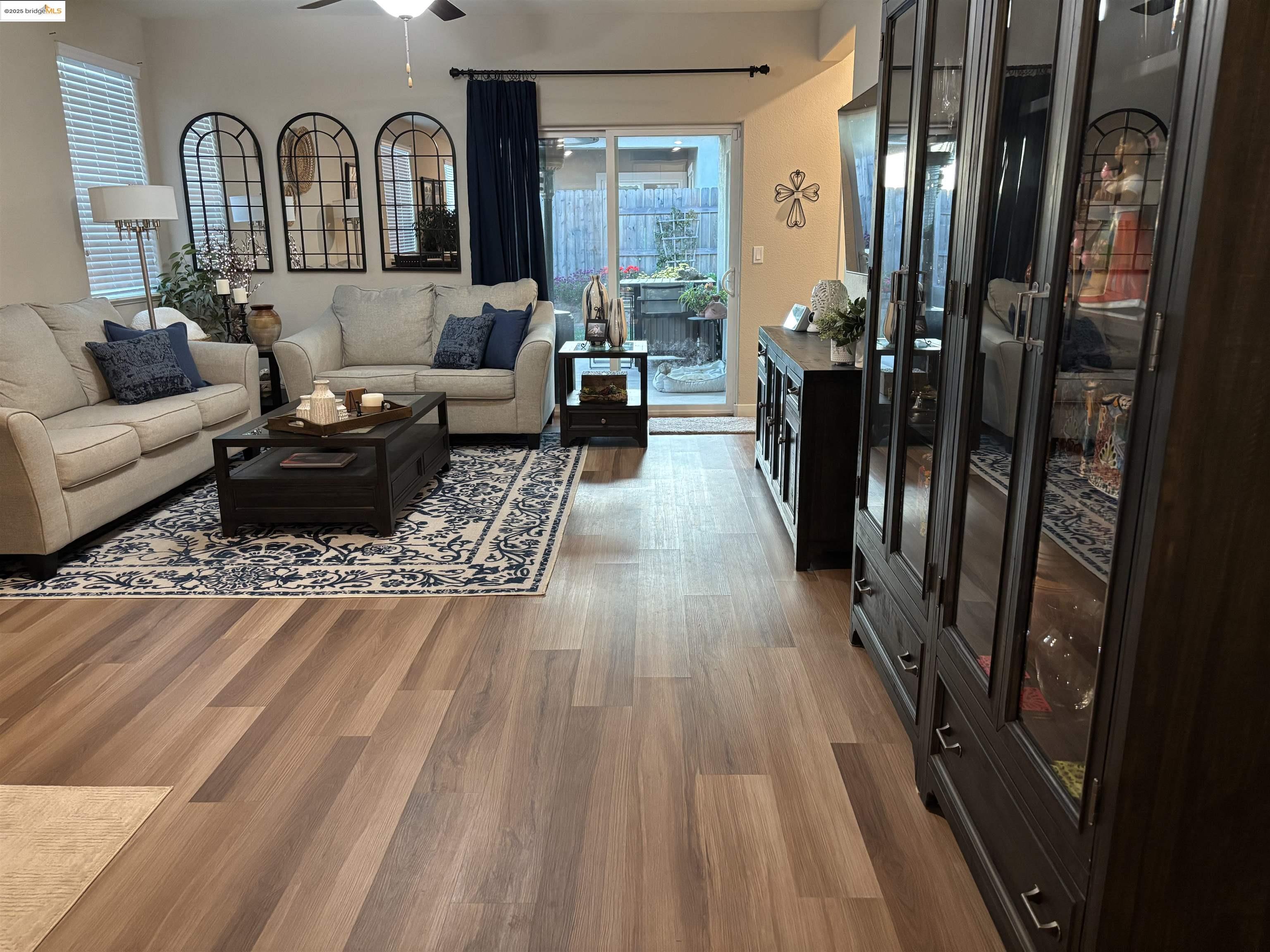 2107 Lavender Place Rio Vista, CA 94571 - Photo 16 of 45 a living room with furniture fireplace and wooden floor