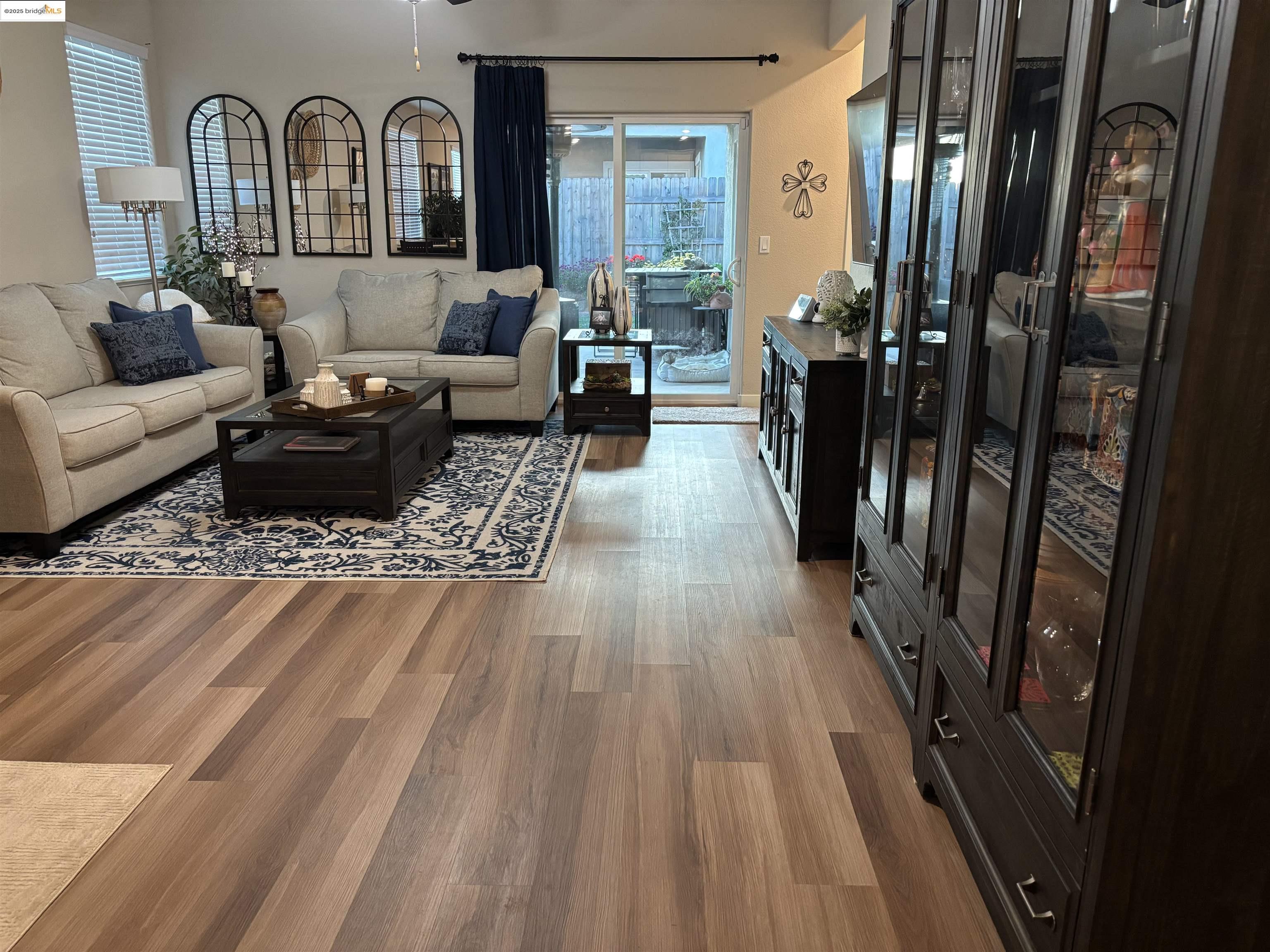 2107 Lavender Place Rio Vista, CA 94571 - Photo 17 of 45 a living room with furniture fireplace and wooden floor