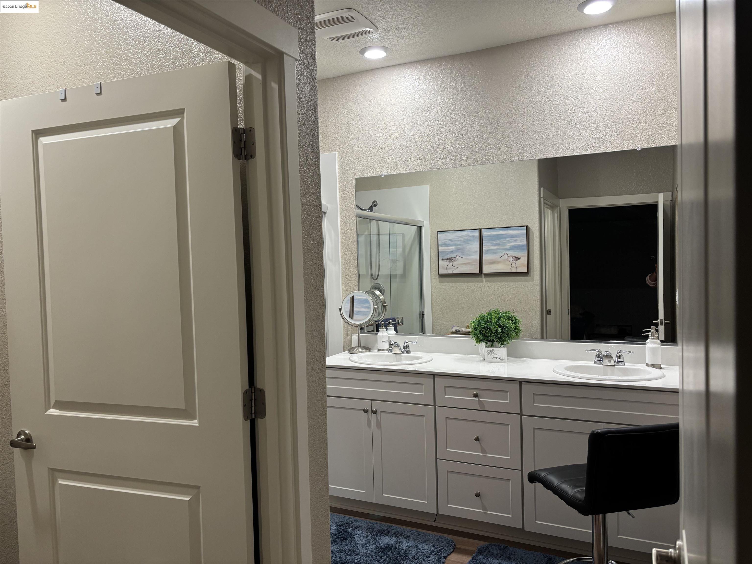 2107 Lavender Place Rio Vista, CA 94571 - Photo 23 of 45 a bathroom with a double vanity sink and mirror