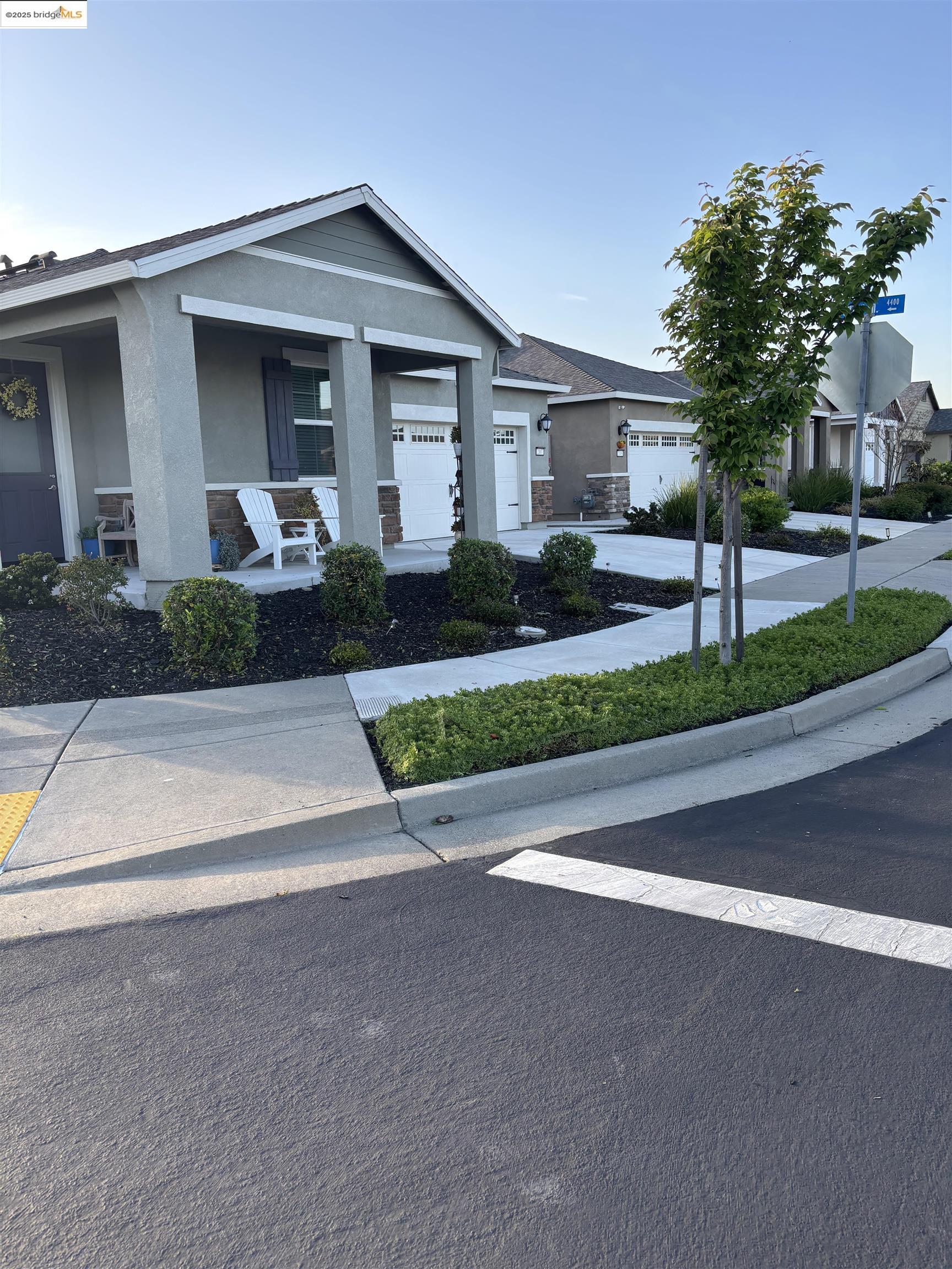 2107 Lavender Place Rio Vista, CA 94571 - Photo 44 of 45 a front view of a house with a yard and garage