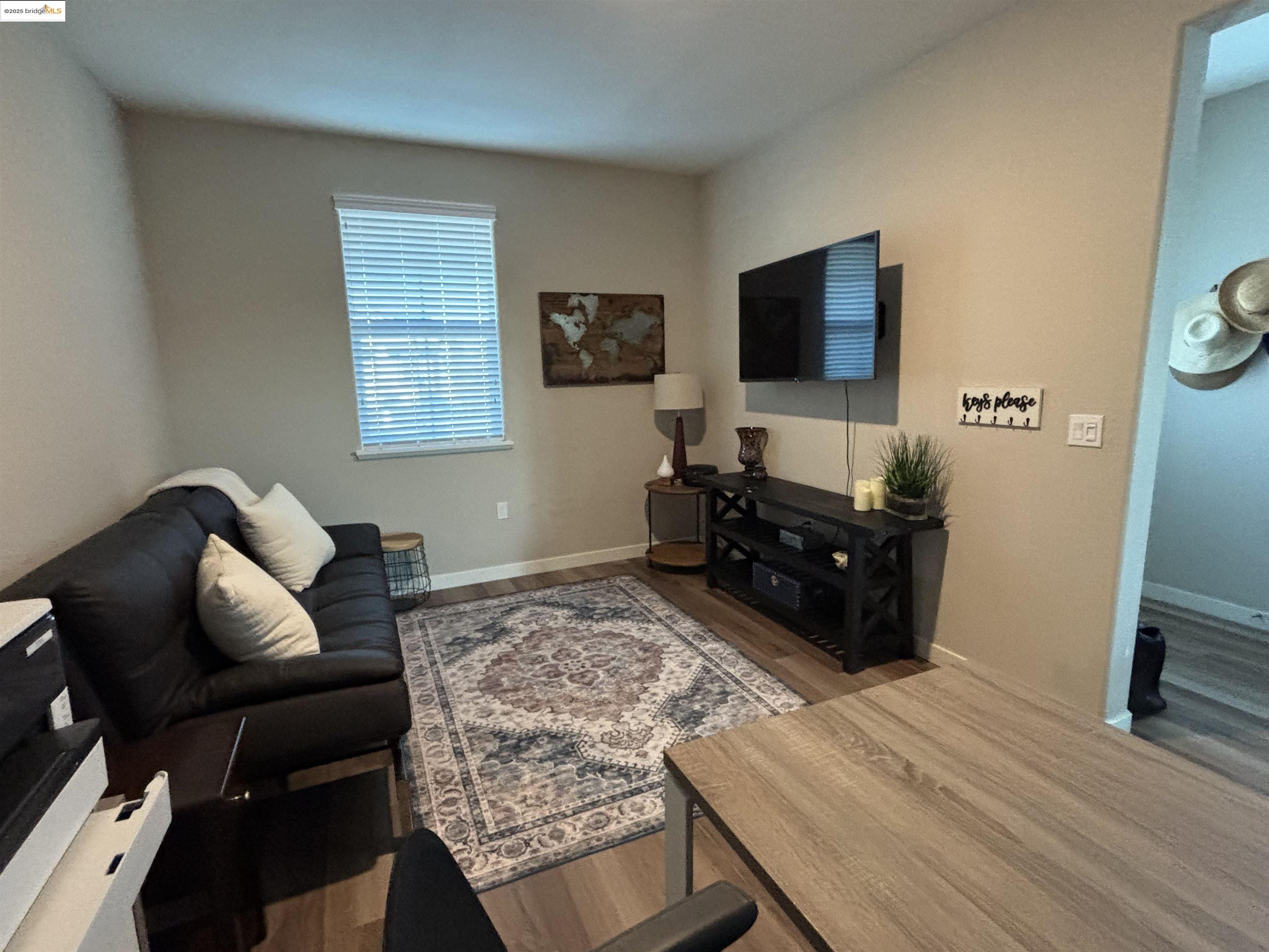 2107 Lavender Place Rio Vista, CA 94571 - Photo 5 of 45 a living room with furniture and a flat screen tv
