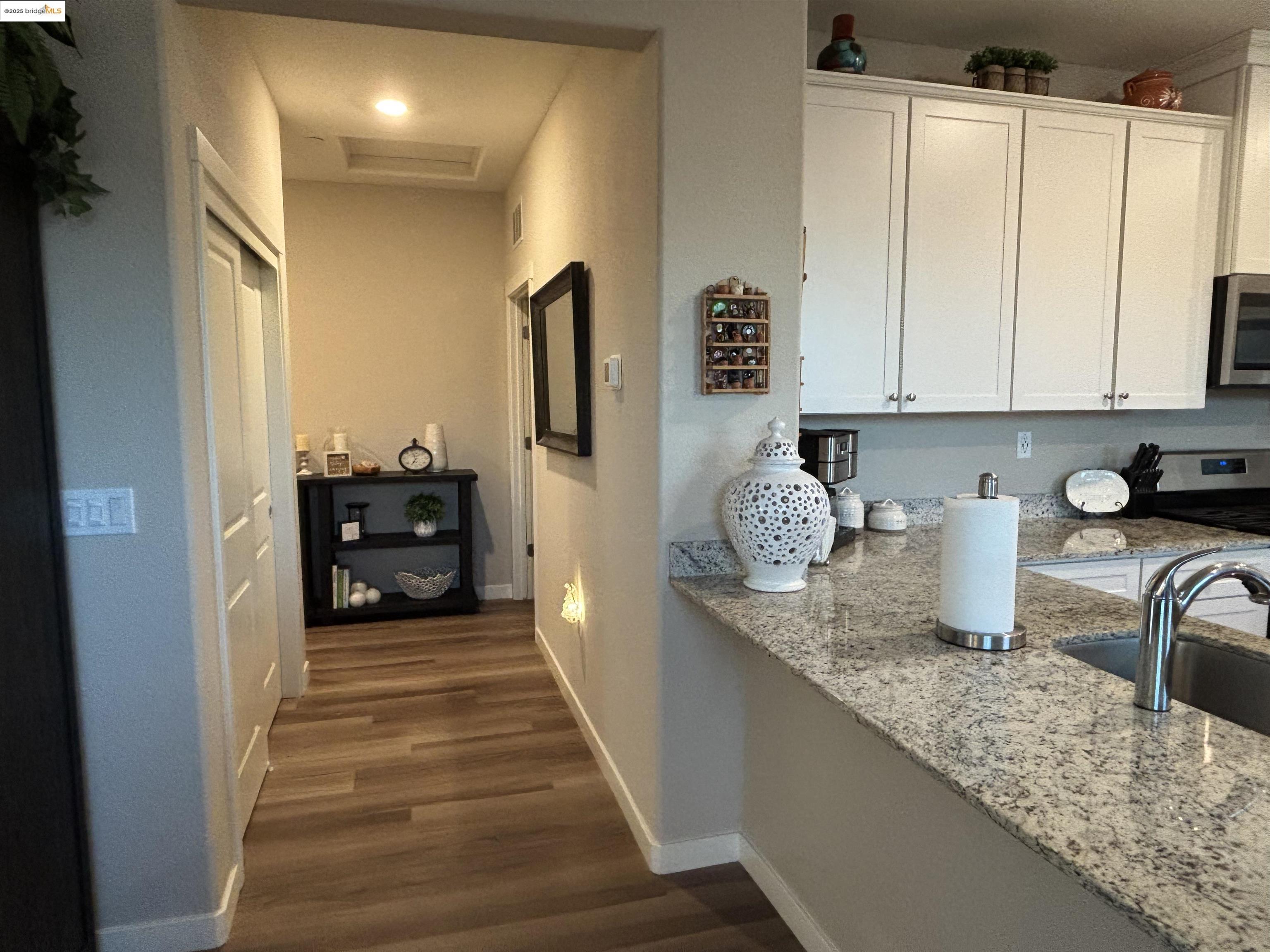 2107 Lavender Place Rio Vista, CA 94571 - Photo 8 of 45 a kitchen with granite countertop a sink and cabinets