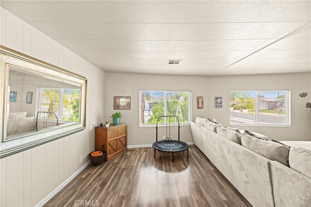 2964 Silver Oak Way Hemet, CA 92545 - Photo 12 of 60 a living room with furniture and a large window
