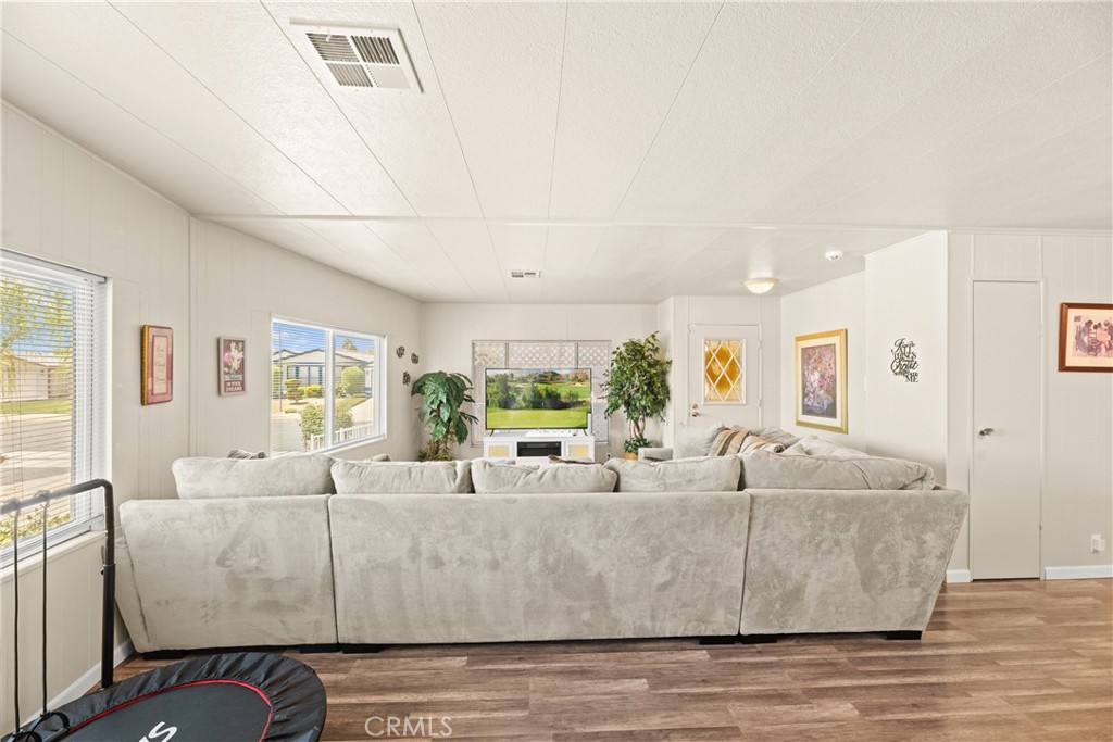 2964 Silver Oak Way Hemet, CA 92545 - Photo 13 of 60 a living room with furniture and a large window