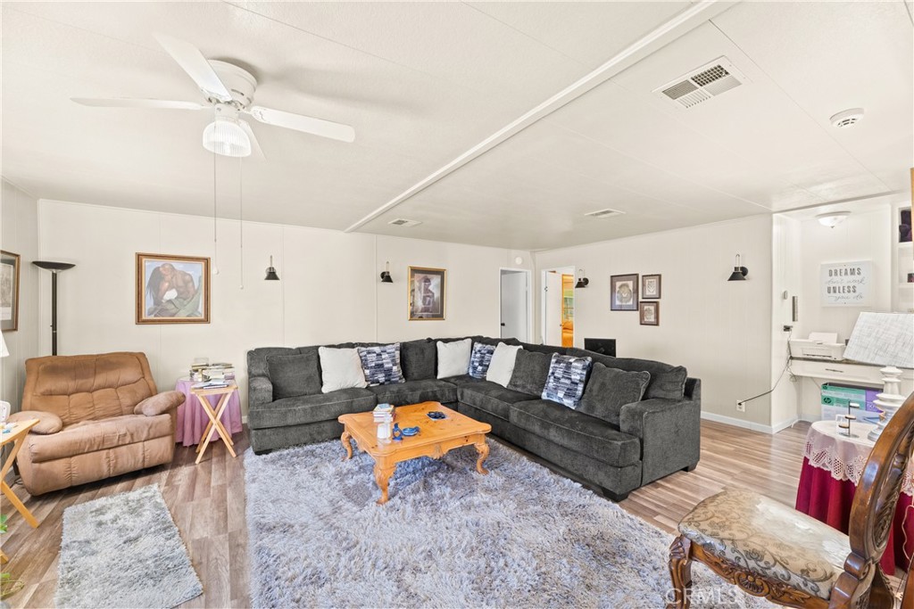 2964 Silver Oak Way Hemet, CA 92545 - Photo 28 of 60 a living room with furniture