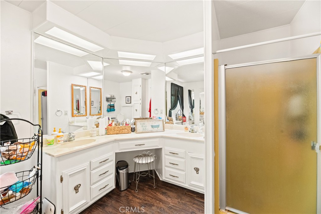2964 Silver Oak Way Hemet, CA 92545 - Photo 36 of 60 a spacious bathroom with a double vanity sink mirror and