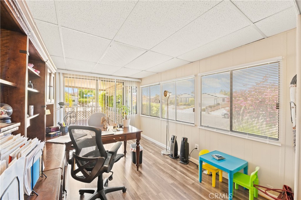 2964 Silver Oak Way Hemet, CA 92545 - Photo 41 of 60 a view of a dining room with furniture a chandelier and wooden floor