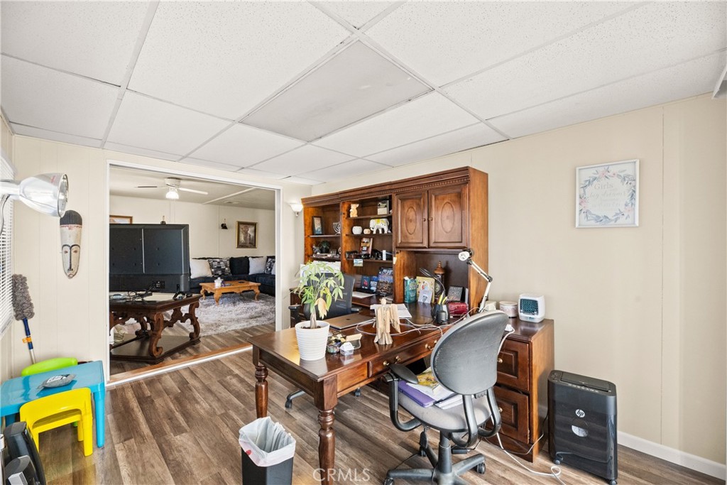 2964 Silver Oak Way Hemet, CA 92545 - Photo 42 of 60 a room with furniture a rug and a window