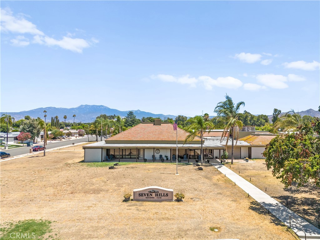 2964 Silver Oak Way Hemet, CA 92545 - Photo 58 of 60 a view of swimming pool with outdoor seating and a garden