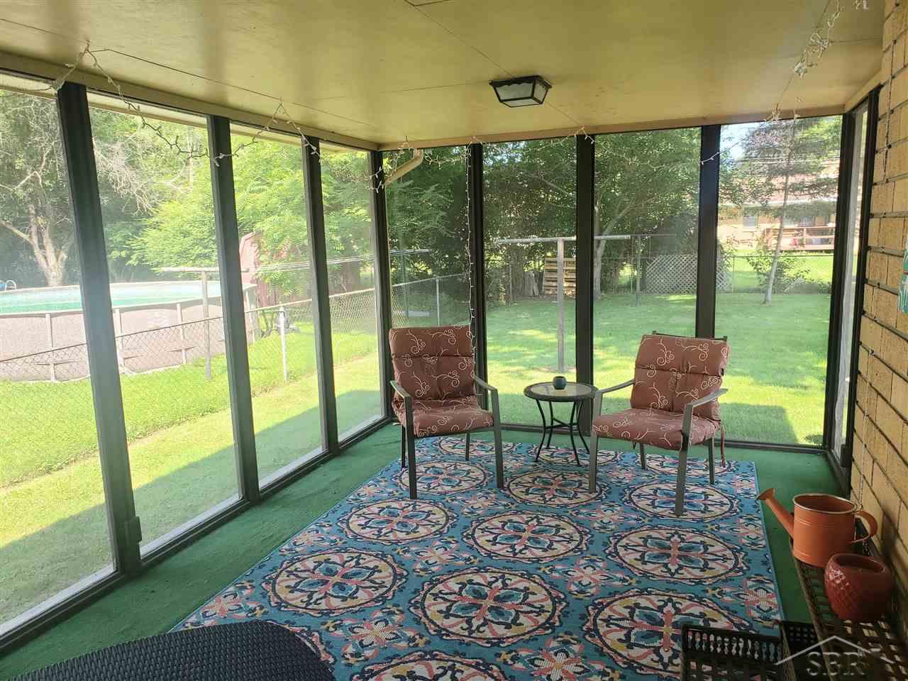 1316 Riser Drive Saginaw, MI 48638 - Photo 20 of 27 Sun Porch